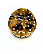 Pinza tonda con borchie