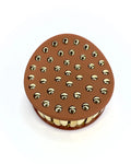 Pinza tonda con borchie