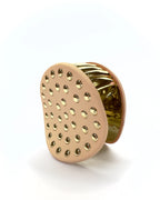 Pinza tonda con borchie